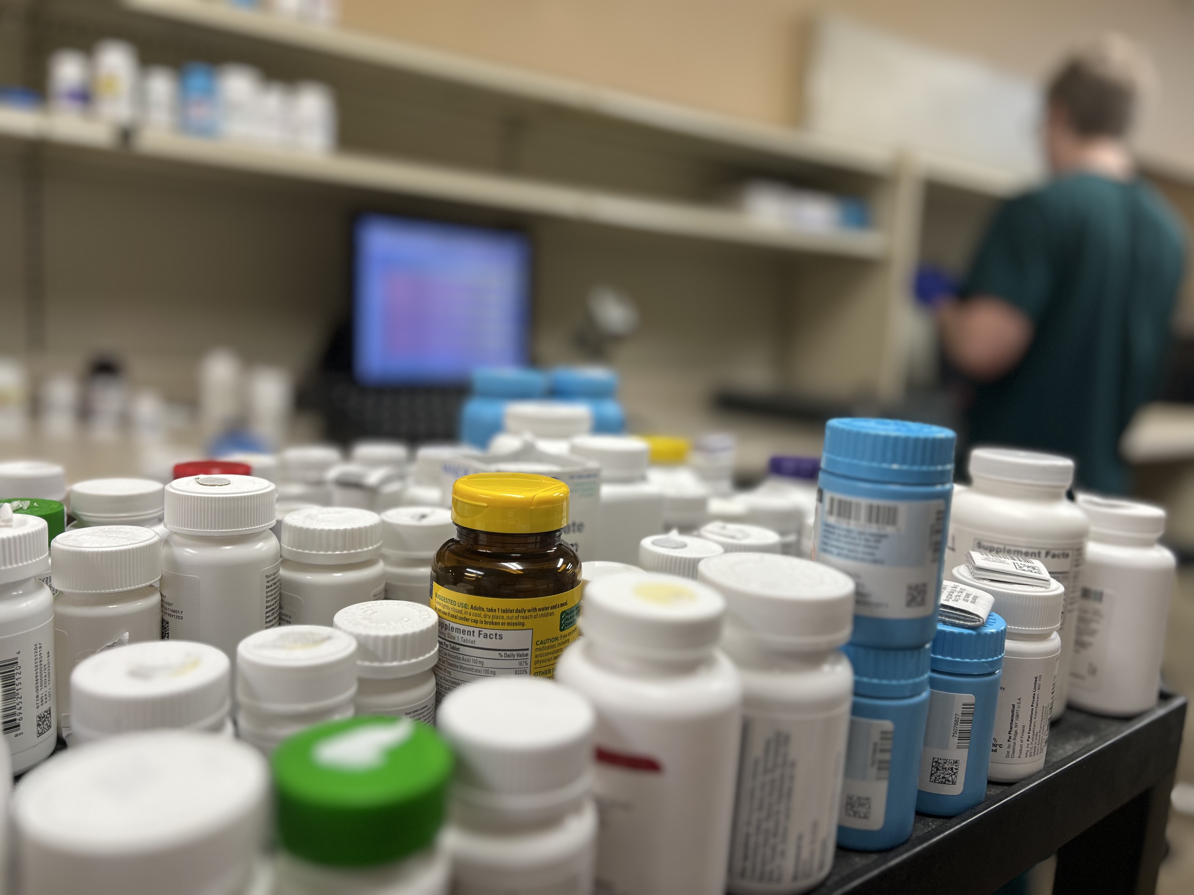 Pharmacist consulting a patient