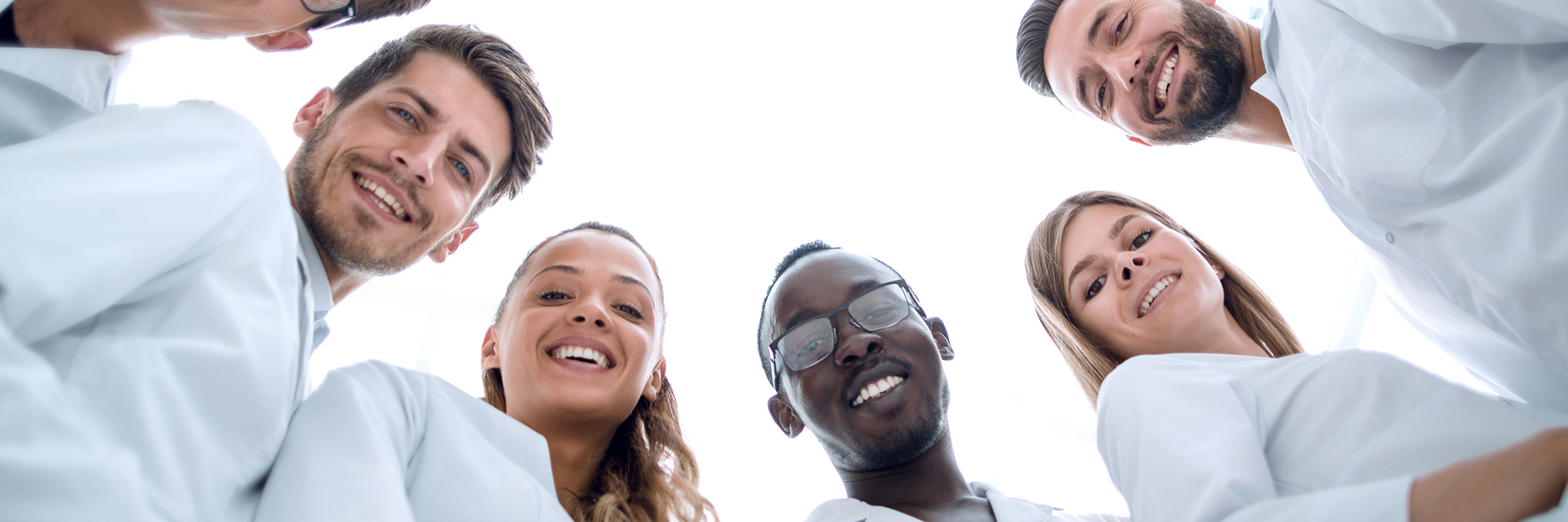 Group of young people smiling at camera